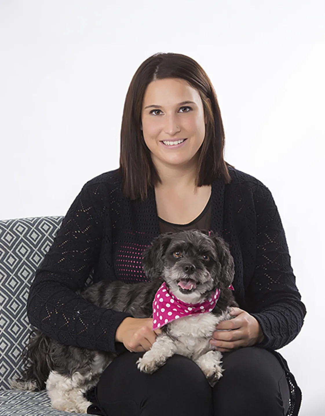 Kortney posing with a small scruffy dog Kortney posing with a small scruffy dog