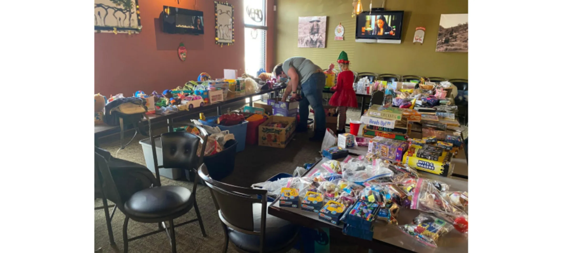 Donation supplies, toys, and goodies from Sunset Pet Lodge for Pay It Forward Christmas Event