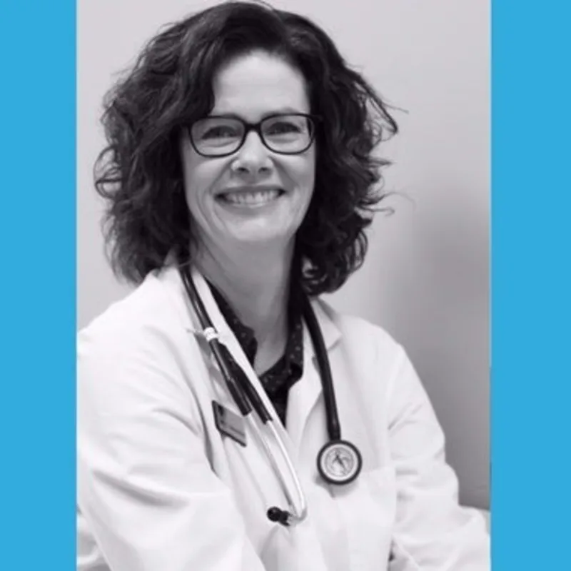 Dr. Suzanne Adams-Hird smiling in front of the camera. Dr. Suzanne Adams-Hird smiling in front of the camera.