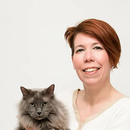 Dr. Angie Robinson with a gray cat