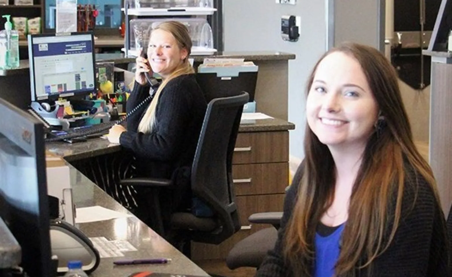 Picture of two receptionists Picture of two receptionists