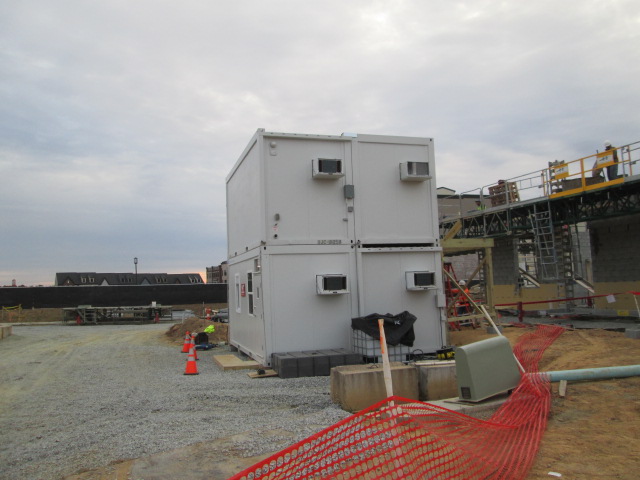 Four stacked containers at the VVC Shortpump construction site