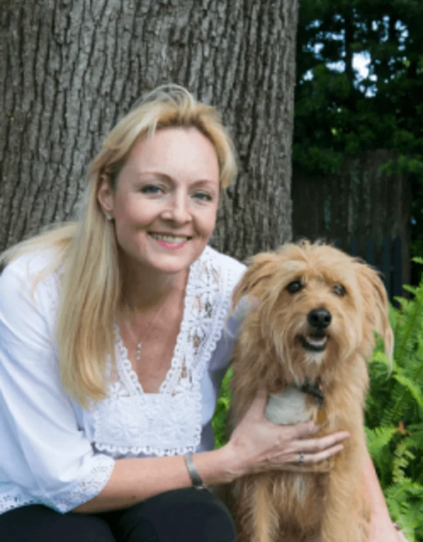 Allison Steele Wegmann with a brown dog