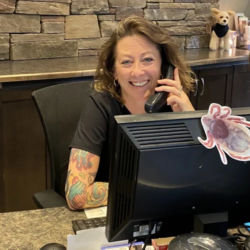 Sarah Beth at the front desk