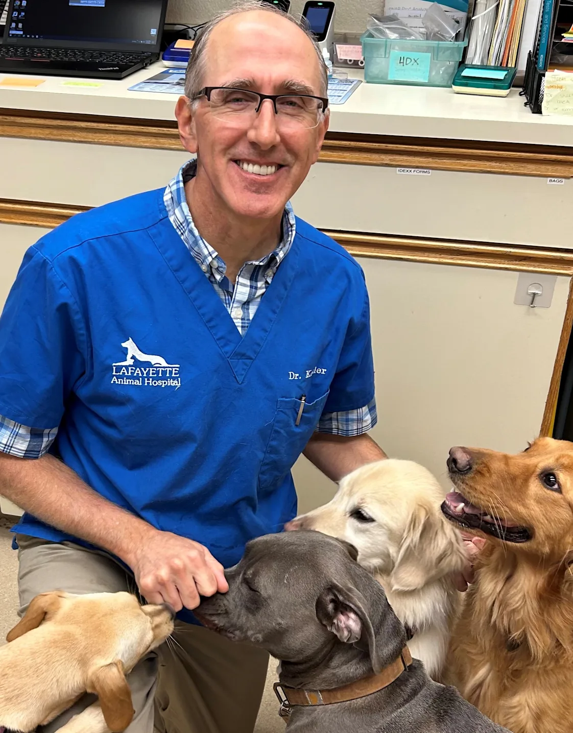 Dr. William Kestler with black and white dog Dr. William Kestler with black and white dog