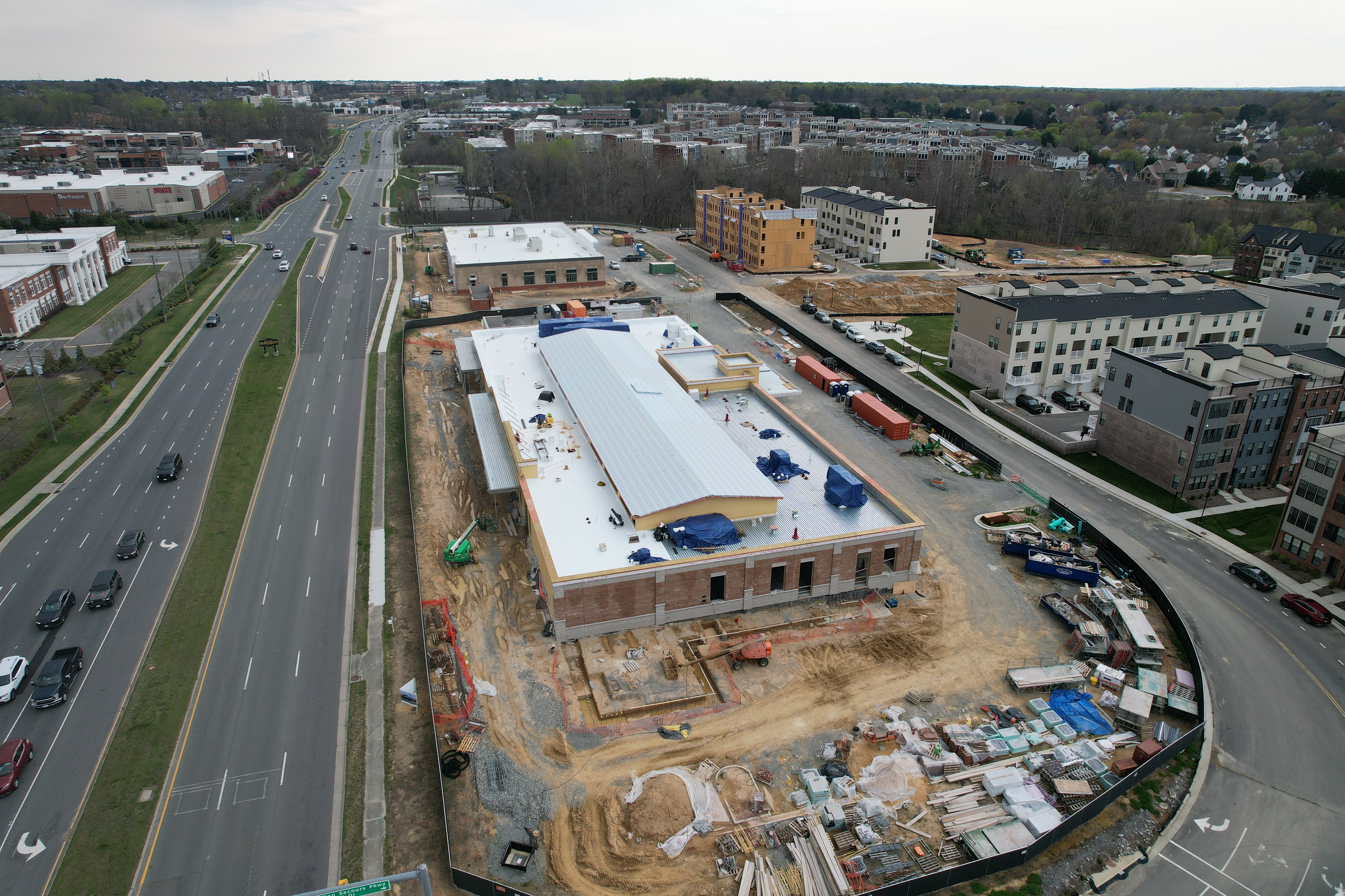 An aerial view of a large building being constructed.