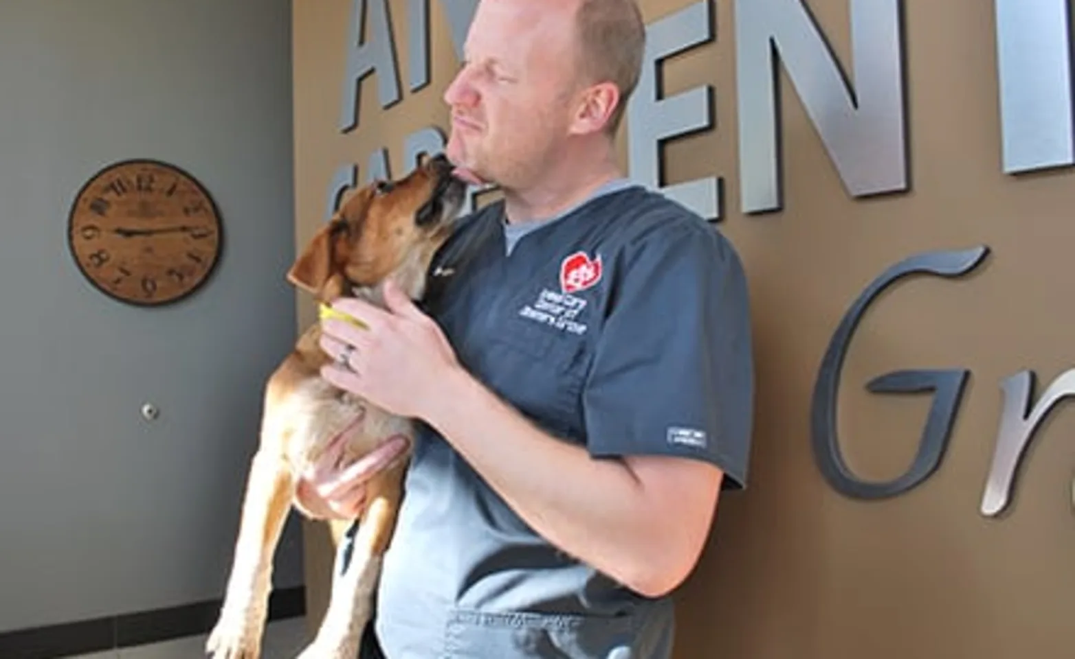 Animal Care Center of Downers Grove Vet with dog