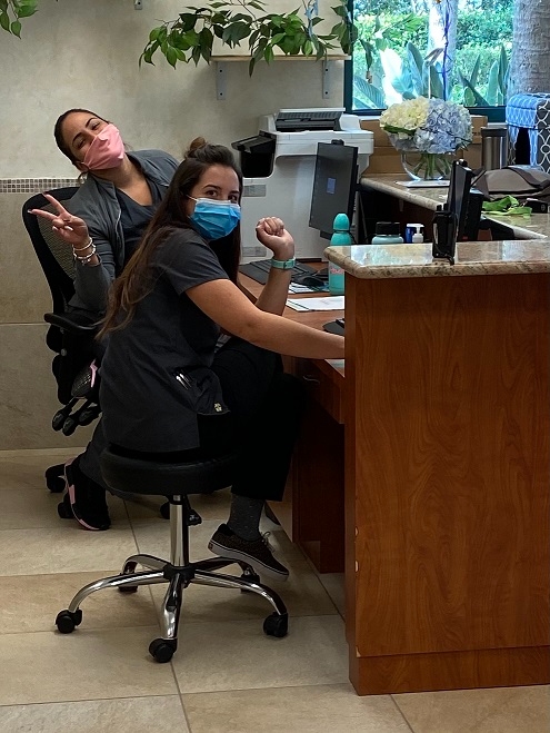 Rose and Aly at the desk.