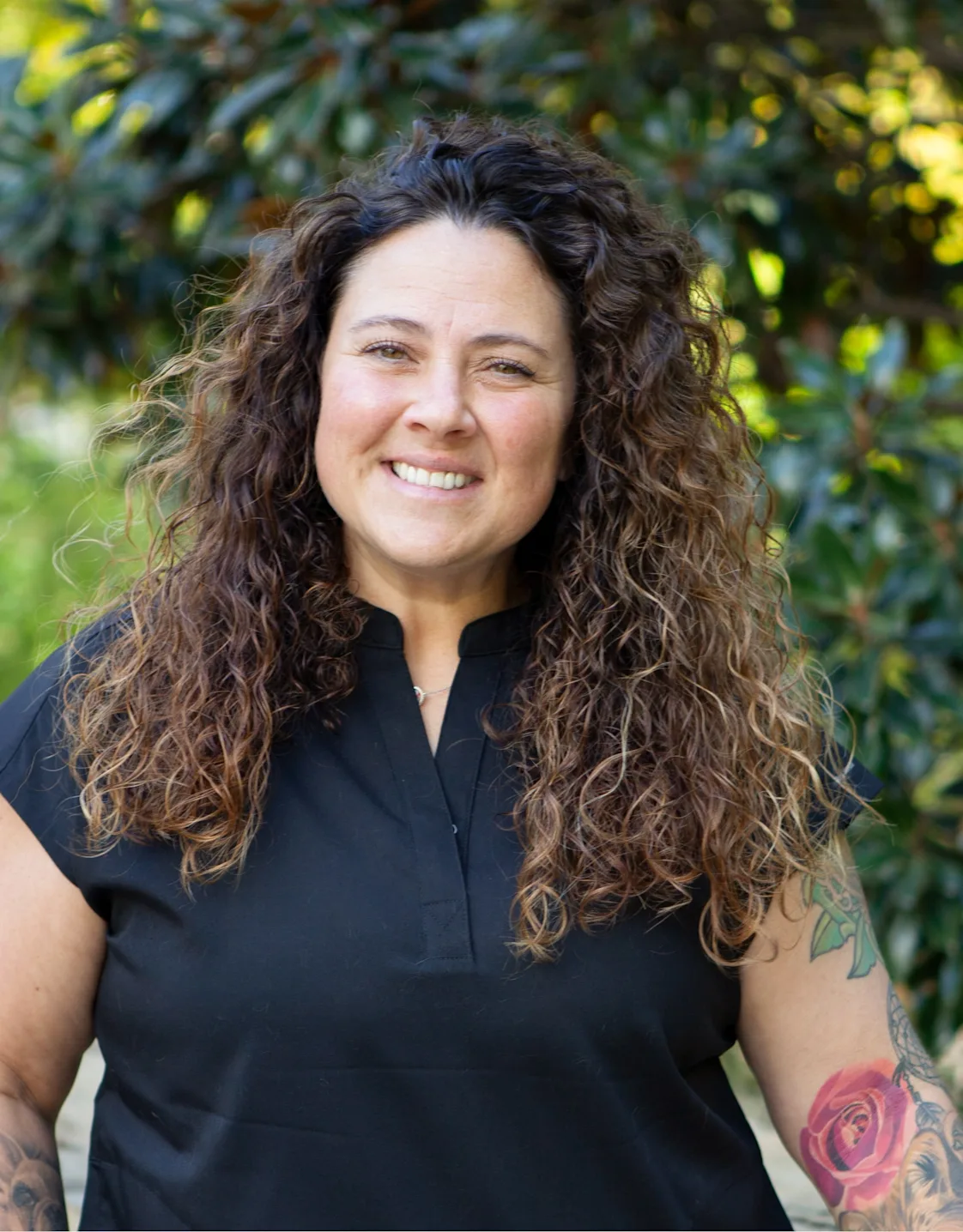 Misty Wilson R.V.T. Smiling while Holding a Dog Misty Wilson R.V.T. Smiling while Holding a Dog