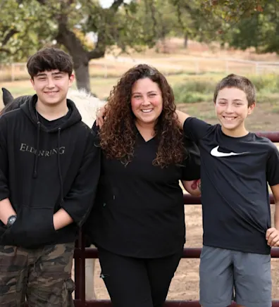 Misty Wilson R.V.T. Smiling while Holding a Dog Misty Wilson R.V.T. Smiling while Holding a Dog