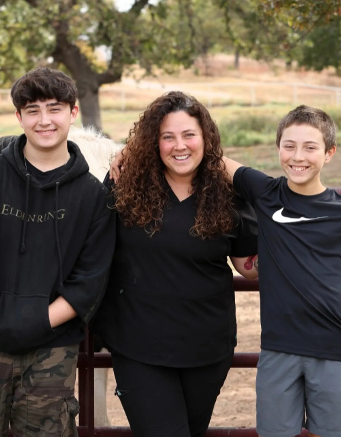Misty Wilson R.V.T. Smiling while Holding a Dog Misty Wilson R.V.T. Smiling while Holding a Dog