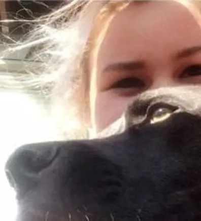 Maddy, employee at Bowhaus, providing boarding, grooming, and daycare services Maddy, employee at Bowhaus, providing boarding, grooming, and daycare services