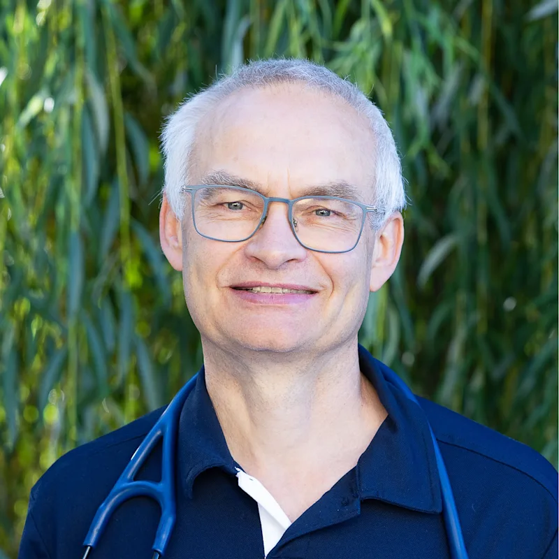 Marco Veenis holding a dog. Marco Veenis holding a dog.