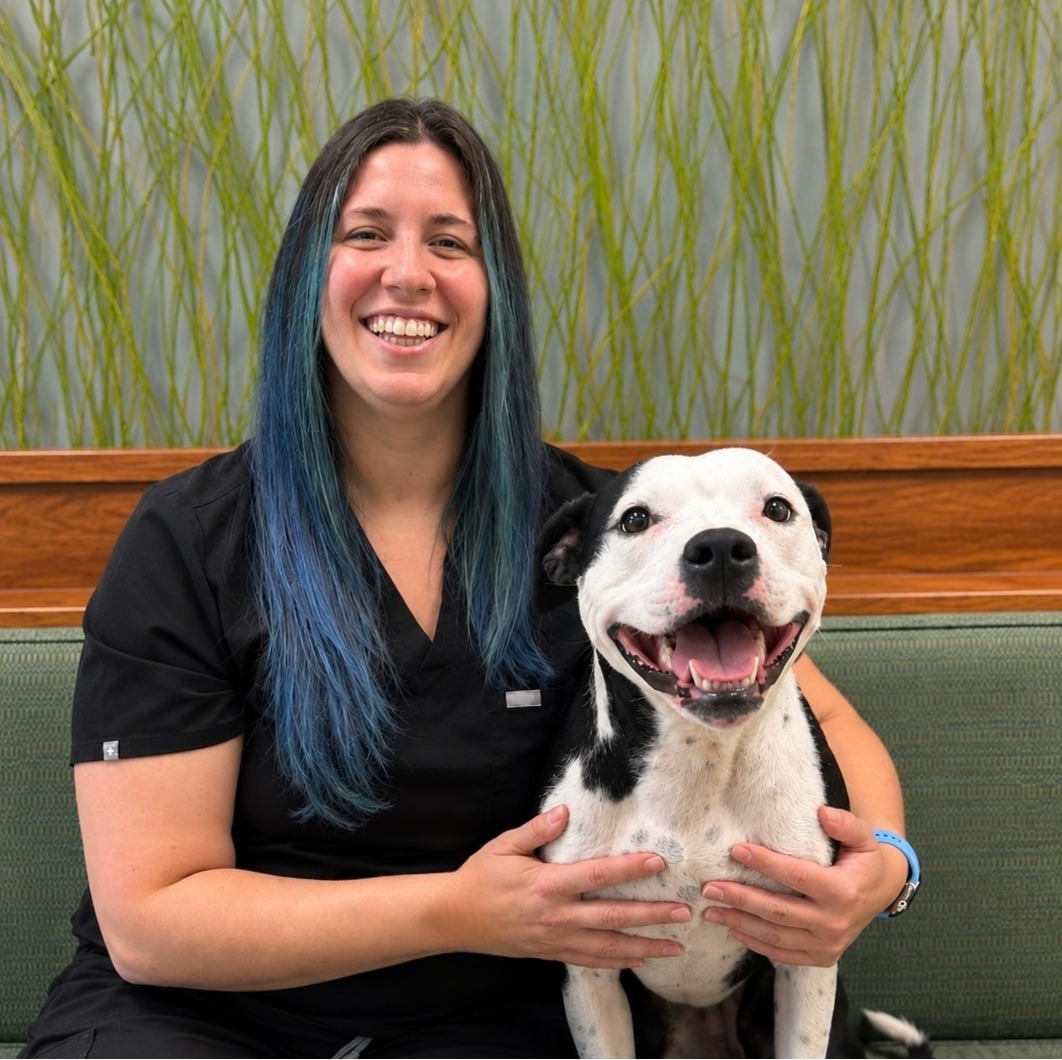 Dr. Melissa Diaz with a dog