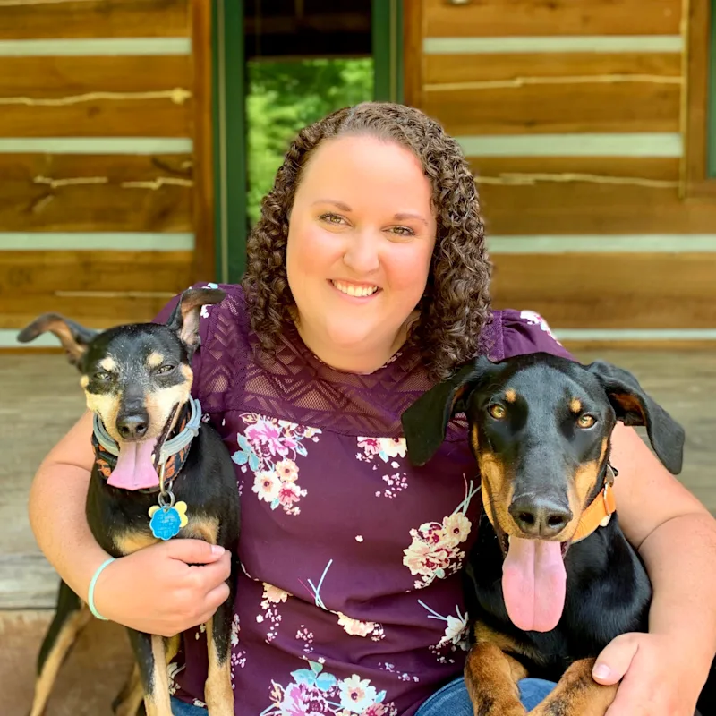 Dr. Laura Gibson WITH TWO DOGS Dr. Laura Gibson WITH TWO DOGS