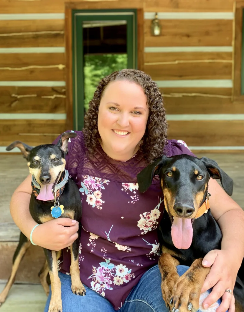 Dr. Laura Gibson WITH TWO DOGS
