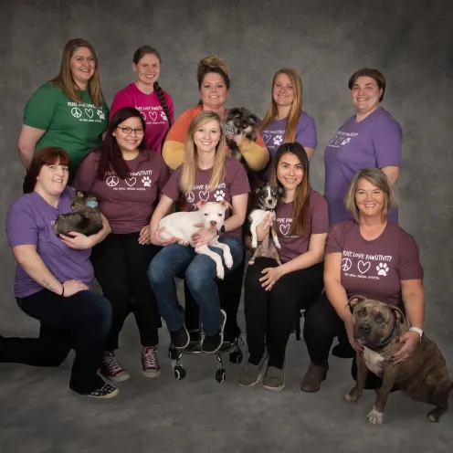 Oak Knoll Animal Hospital staff with dogs
