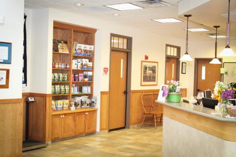 Exam room doors and a shelf full off pet supplies