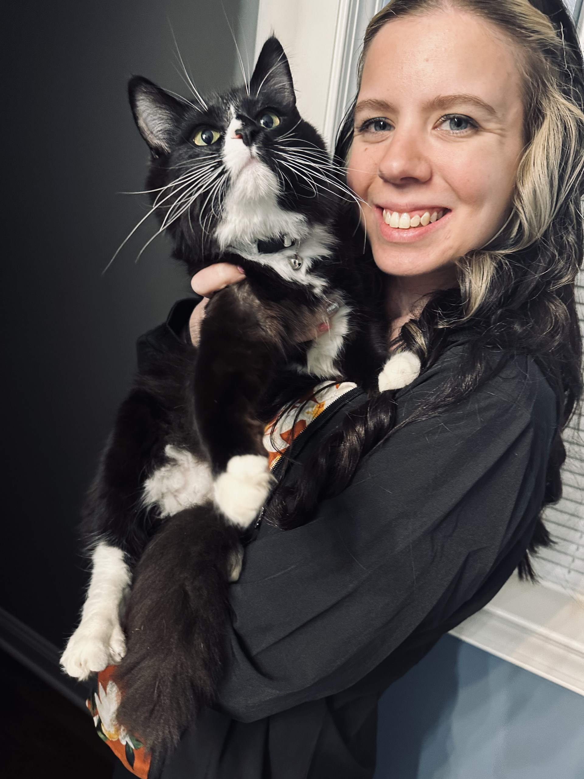 Kelsey holding a cat