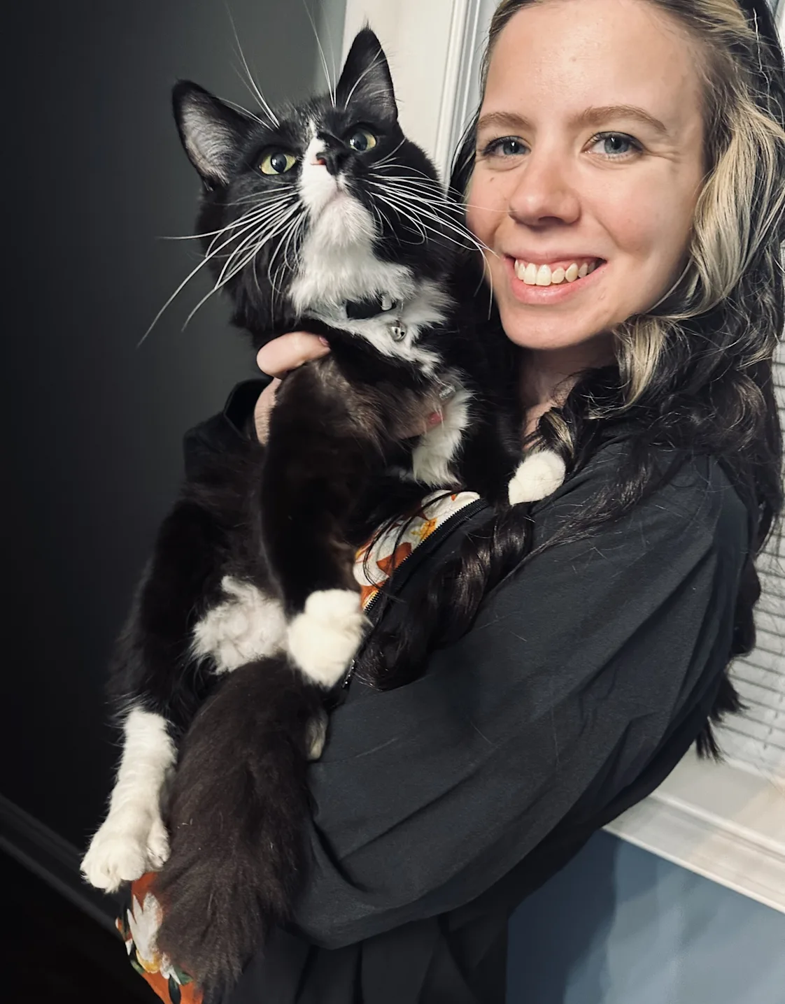 Kelsey holding a cat Kelsey holding a cat