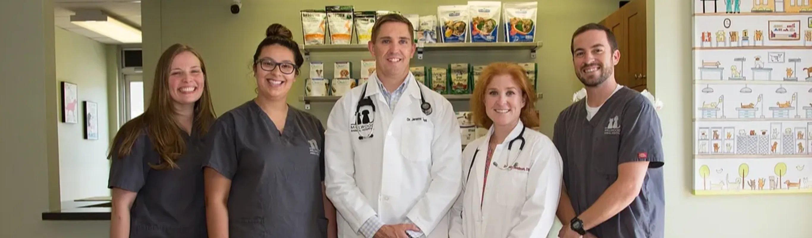 Staff at Millwood Animal Hospital posing in uniform Staff at Millwood Animal Hospital posing in uniform