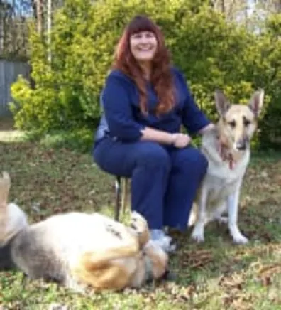 Michelle with two large dogs Michelle with two large dogs