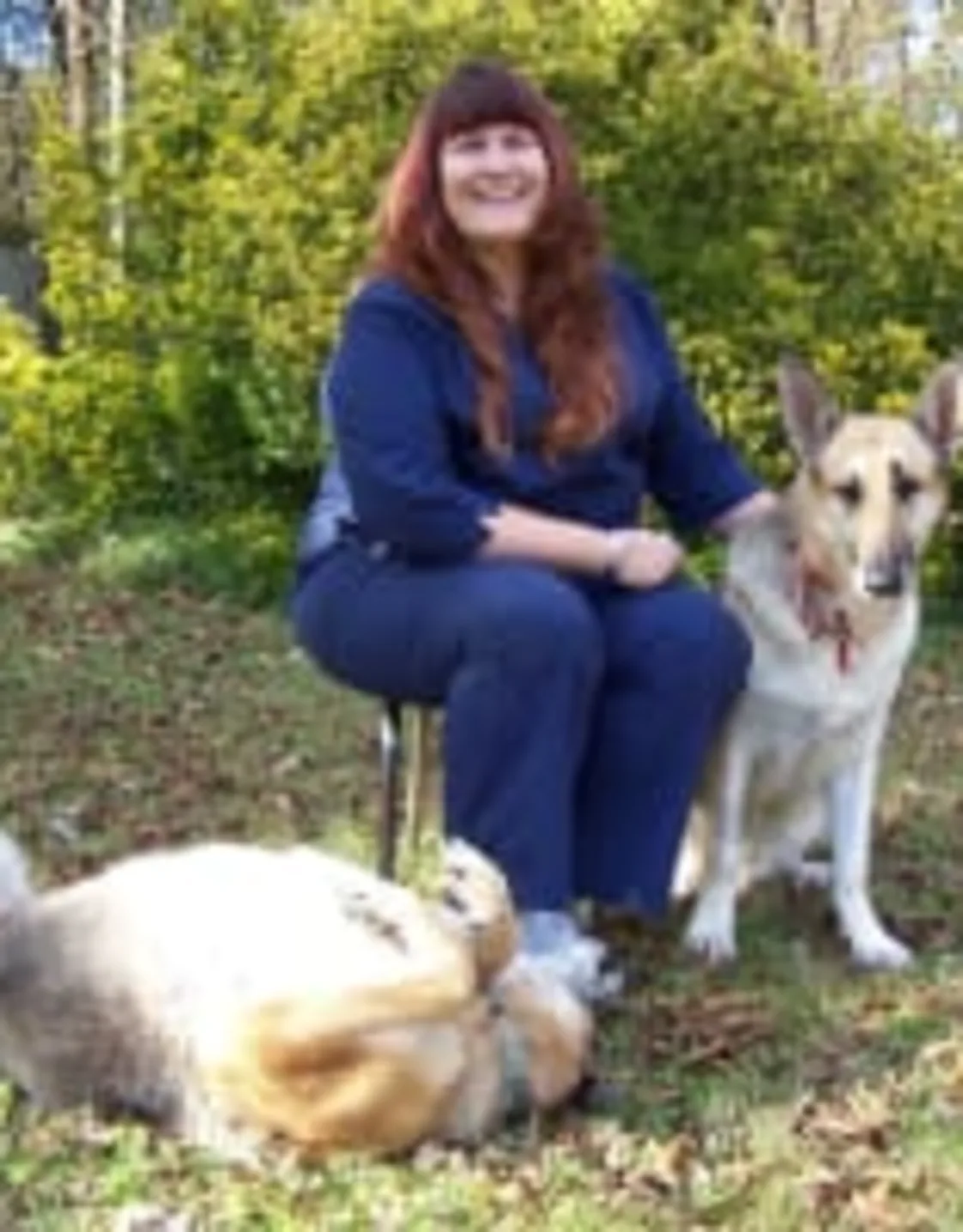 Michelle with two large dogs Michelle with two large dogs