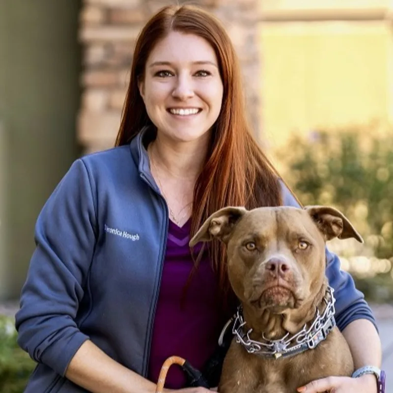 Veronica Hough with a white dog Veronica Hough with a white dog