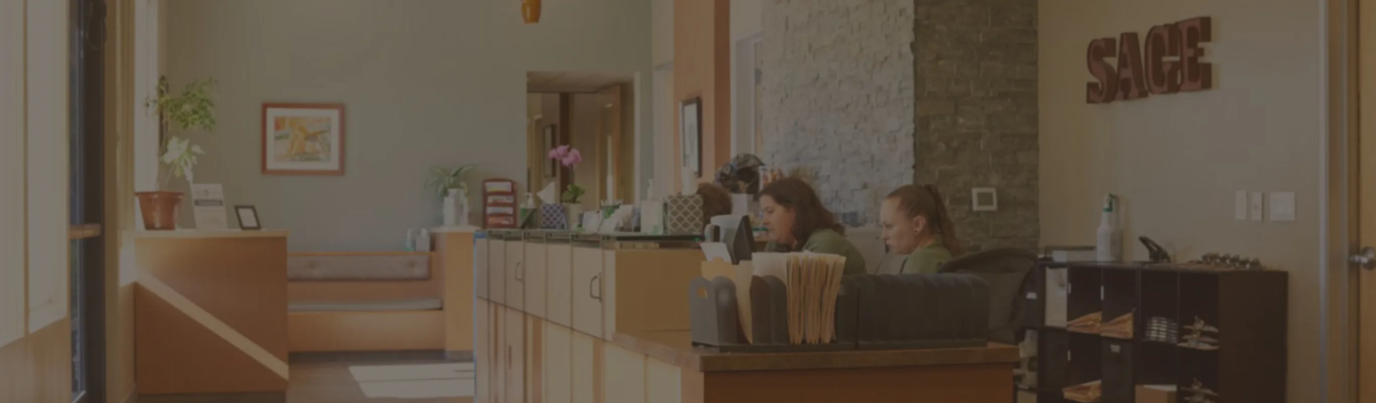 Receptionists working at SAGE Veterinary Center