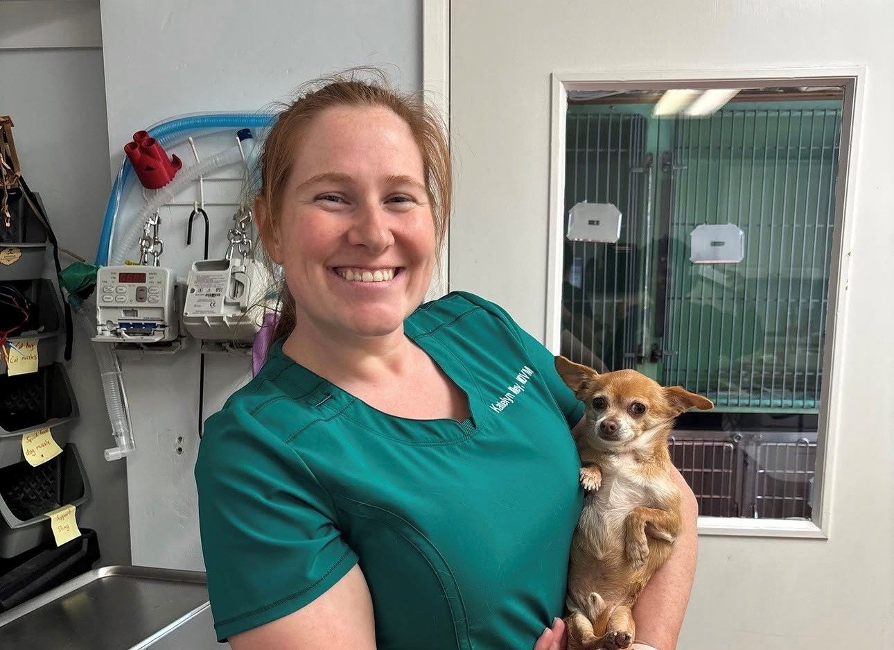 Dr. Kirtley with beige dog
