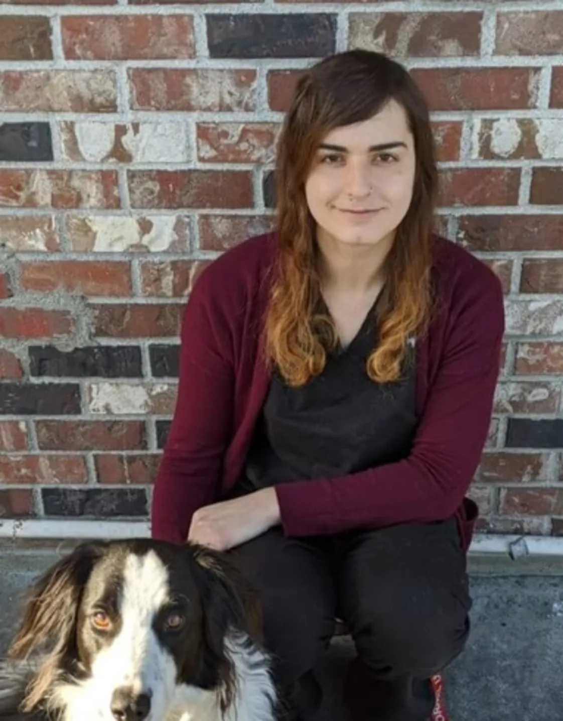 Dr. Gabby Mentis with dog Dr. Gabby Mentis with dog