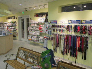 Waiting area and merchandise on shelving at Quail Hollow Animal Hospital