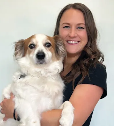 Mackenzie at Clocktower Animal Hospital with white and tan dog