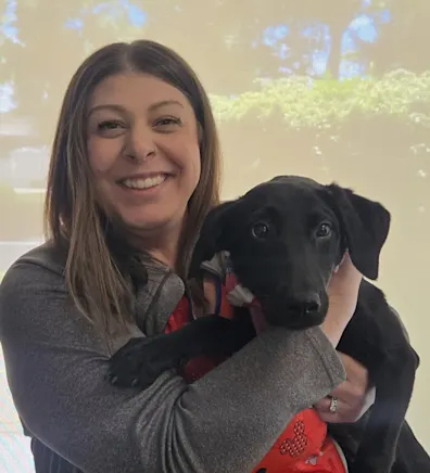 Alicia holding a snake on her arm Alicia holding a snake on her arm