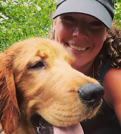 Staff photo of Kathryn and her Irish Golden/Irish Setter dog named Briggs O'Darby Staff photo of Kathryn and her Irish Golden/Irish Setter dog named Briggs O'Darby