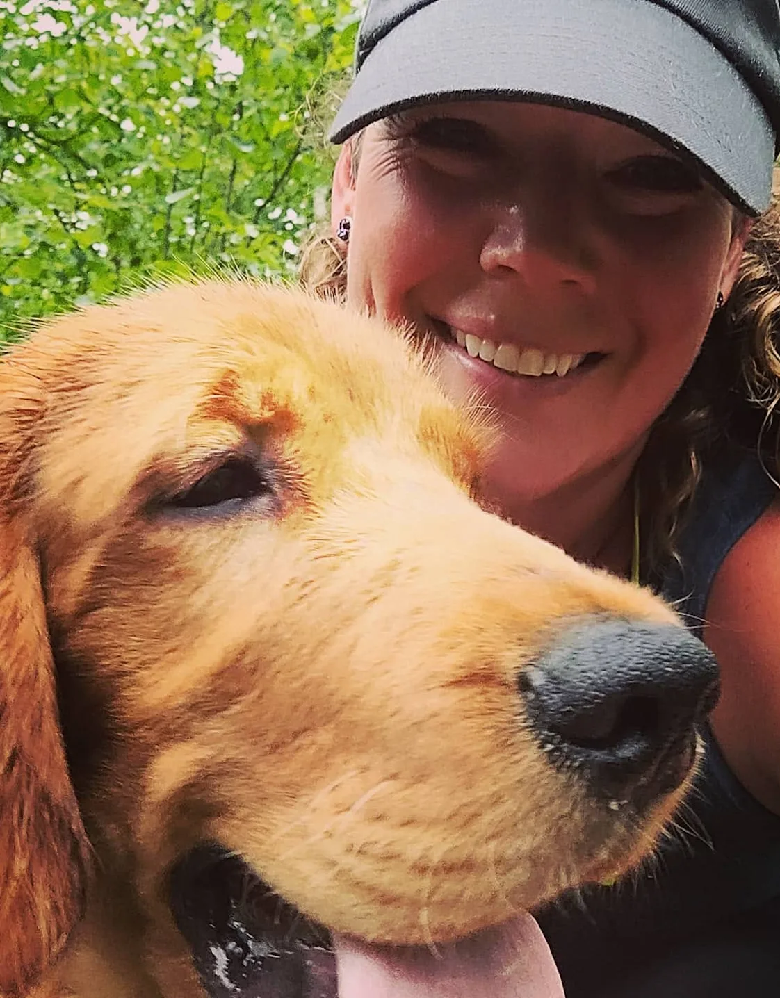 Staff photo of Kathryn and her Irish Golden/Irish Setter dog named Briggs O'Darby Staff photo of Kathryn and her Irish Golden/Irish Setter dog named Briggs O'Darby