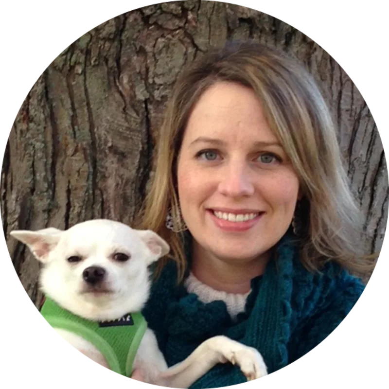 Dr. Katie Manley from Midland Animal Clinic with a dog Dr. Katie Manley from Midland Animal Clinic with a dog