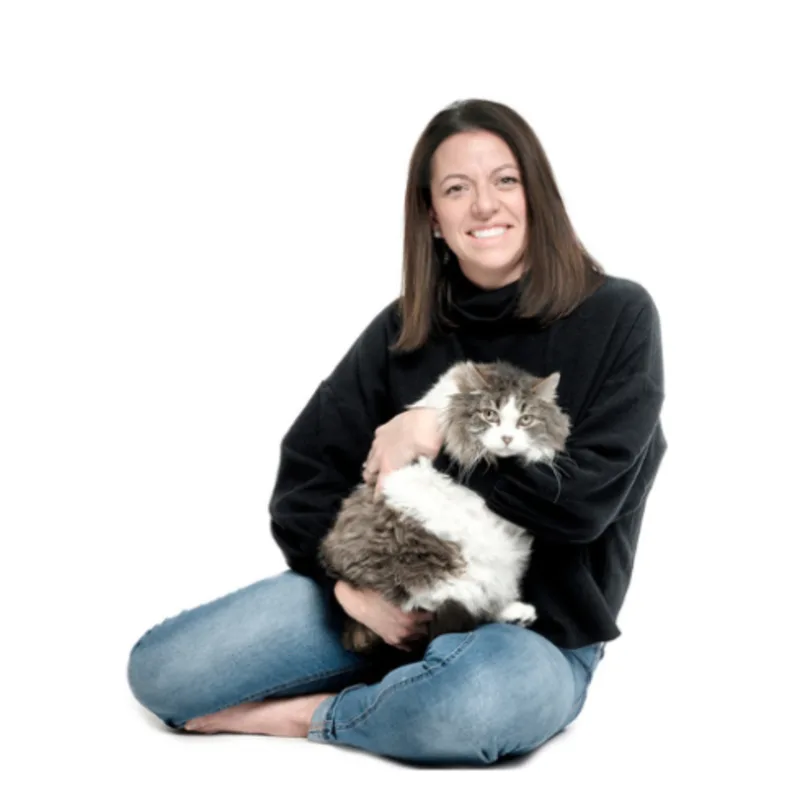 A portrait photo of Dr. Carlie Petrisor with her cat A portrait photo of Dr. Carlie Petrisor with her cat