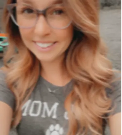 Woman with light hair wearing a grey shirt. Woman with light hair wearing a grey shirt.