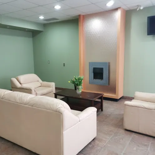Reception Waiting Area with Fireplace at Abbotsford Animal Hospital
