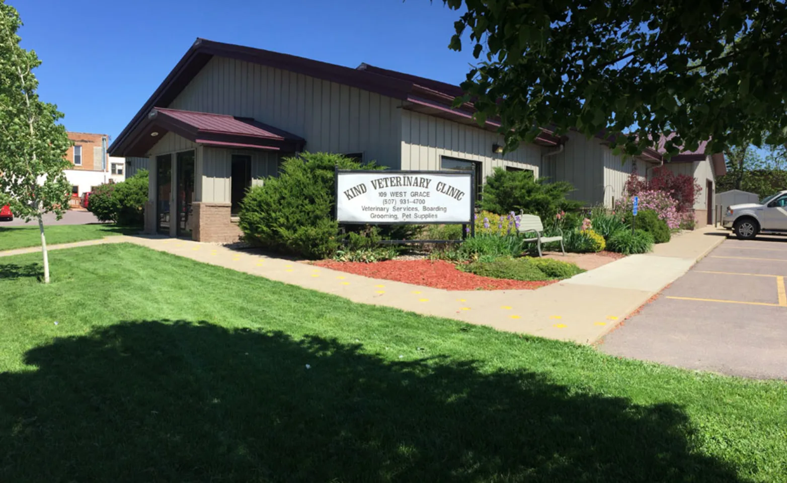 Exterior of Kind Veterinary Clinic with sign in St. Peter, MN.