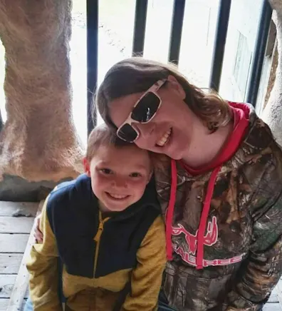 Heather posing with her child Heather posing with her child