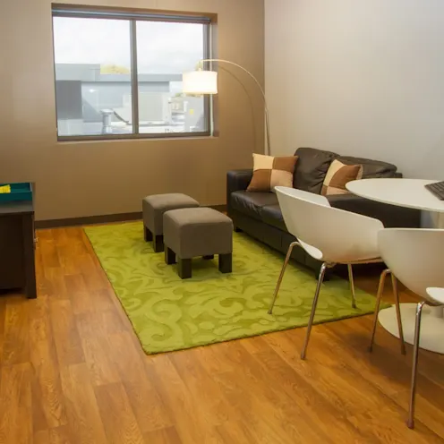 waiting room with couch and table waiting room with couch and table