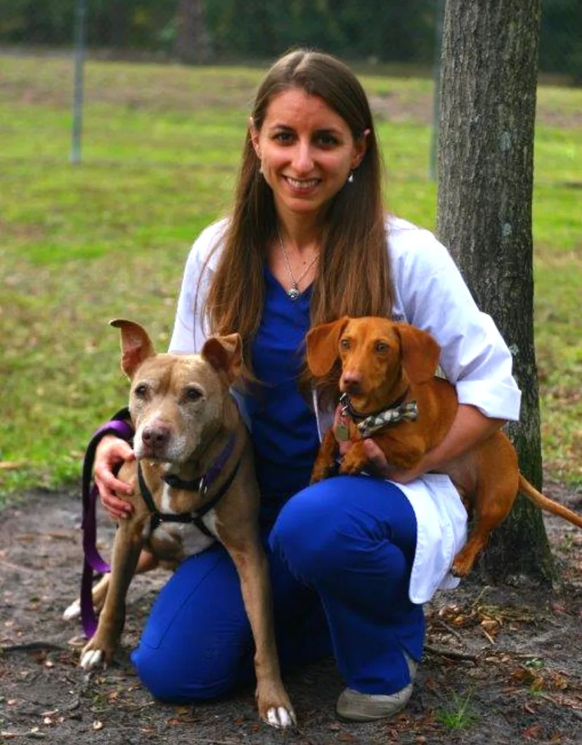 Dr. Gina Barron with two dogs