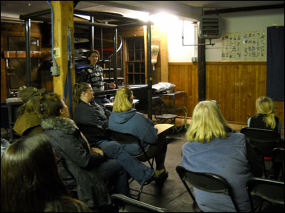 People sitting listening to seminar