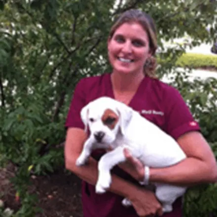 Dr. Marji Bundy WITH A DOG