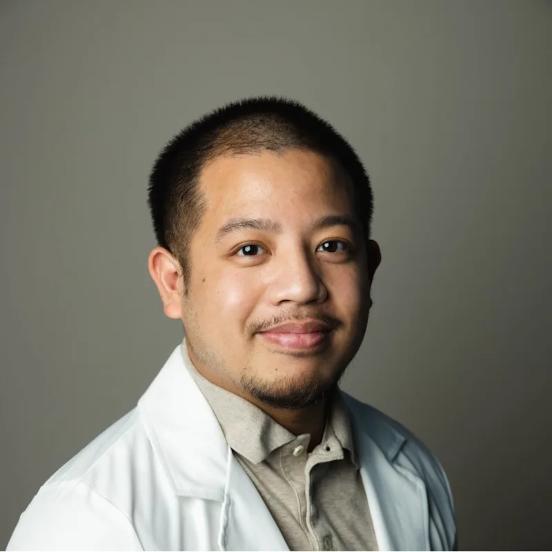 Dr. Enrico Carluen Dr. Enrico Carluen