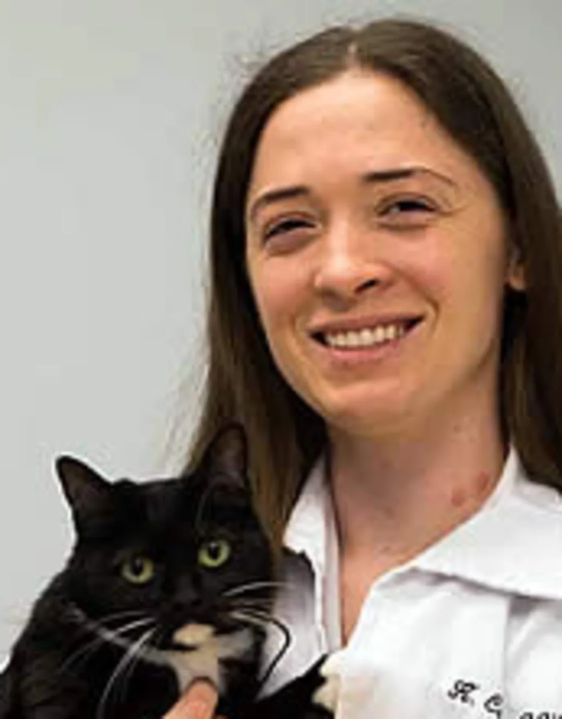 Dr. Croy holding a cat Dr. Croy holding a cat