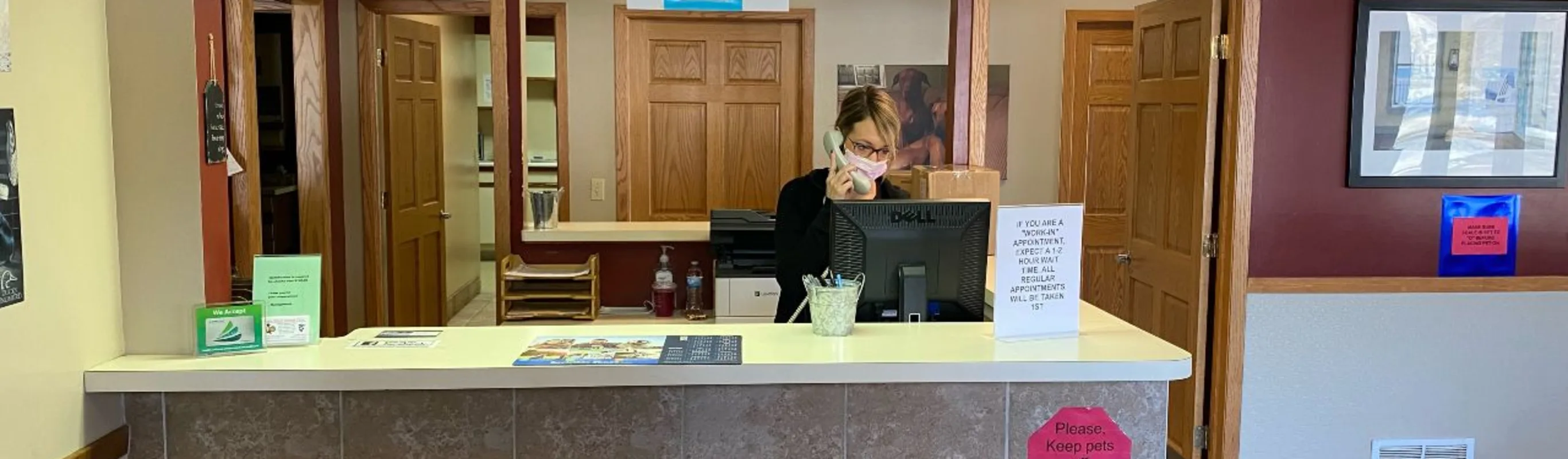 Reception staff in lobby of State Street Animal Clinic. Reception staff in lobby of State Street Animal Clinic.