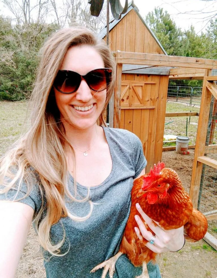Christy holding a chicken